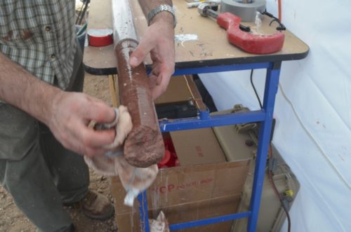 Sediments laid down in what is now Arizona more than 200 million years ago, before the rise of dinosaurs, were matched with similar earlier cores taken in New York and New Jersey. Here, a freshly pulled core.