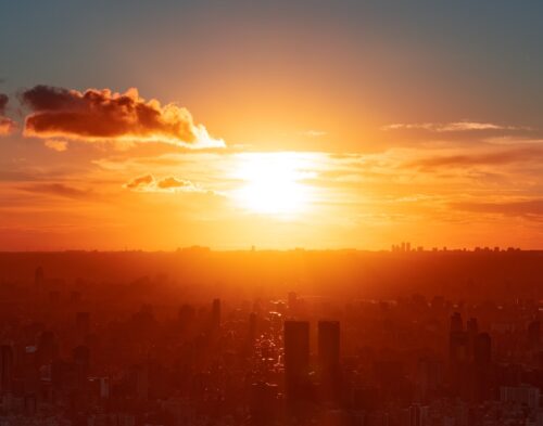 city skyline sun