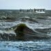Ocean waves near pier
