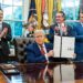 President Donald Trump signs executive orders