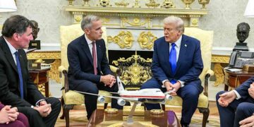 President Donald Trump meets with Canadian Prime Minister Mark Carney in the Oval Office.