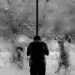 man alone heavy rainfall