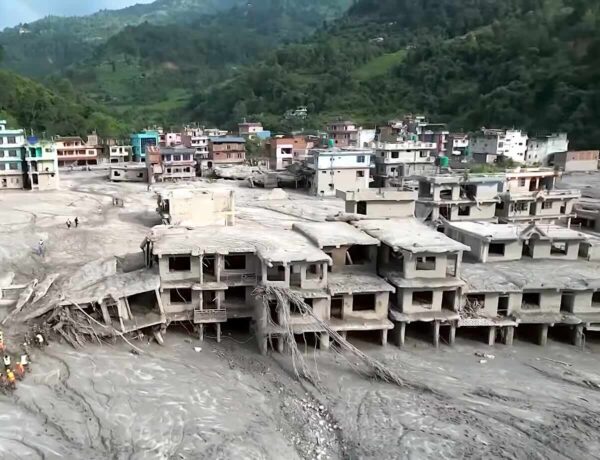 Deadly Nepal landslides leave homes buried in mud and debris.